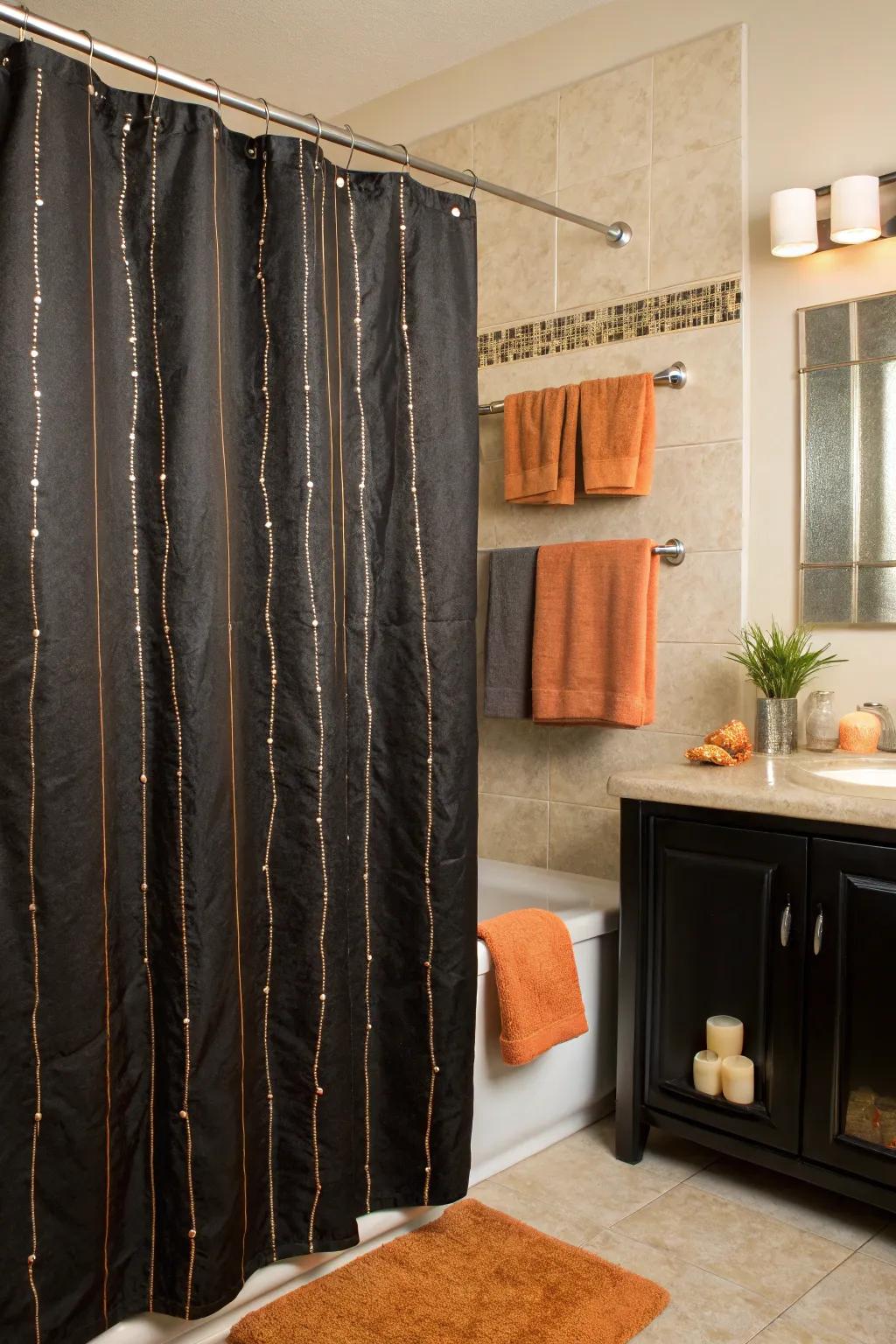 Elevate your decor with subtle metallic threads woven into a black shower curtain.