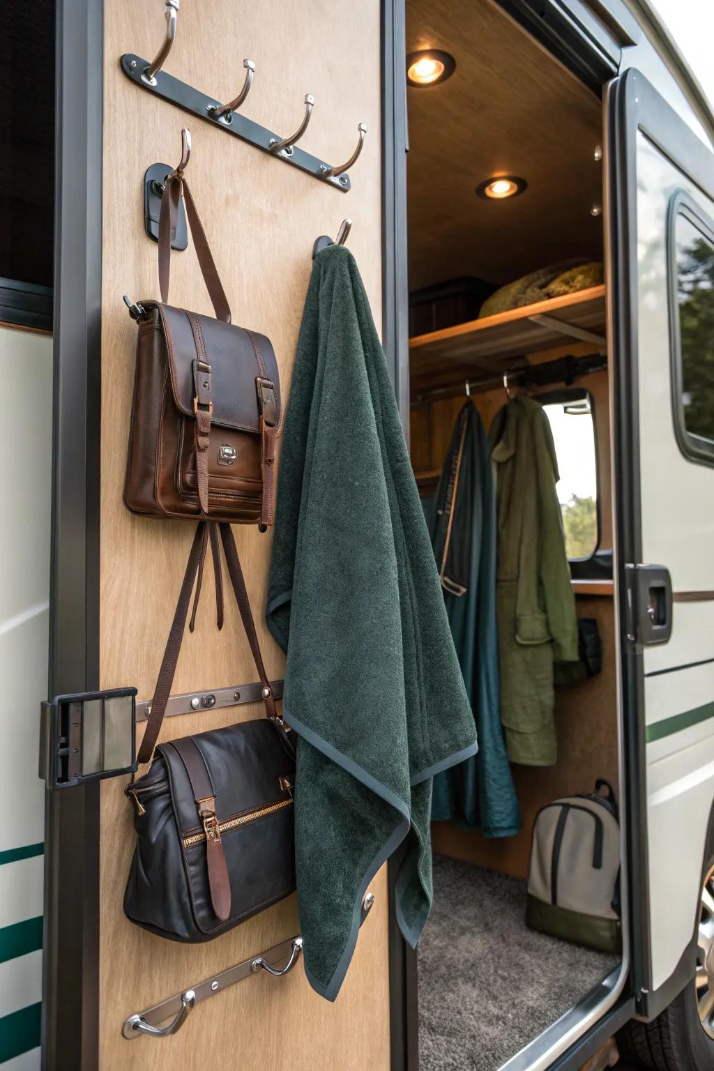 Maximize your space with over-door hooks for easy access. #SpaceHacks #RVDecor
