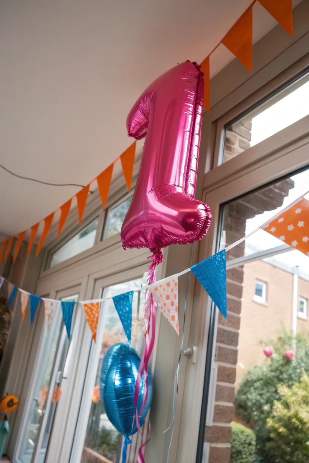 Make the first birthday unforgettable with a standout number balloon centerpiece. 🎈 #FirstBirthday #PartyDecor