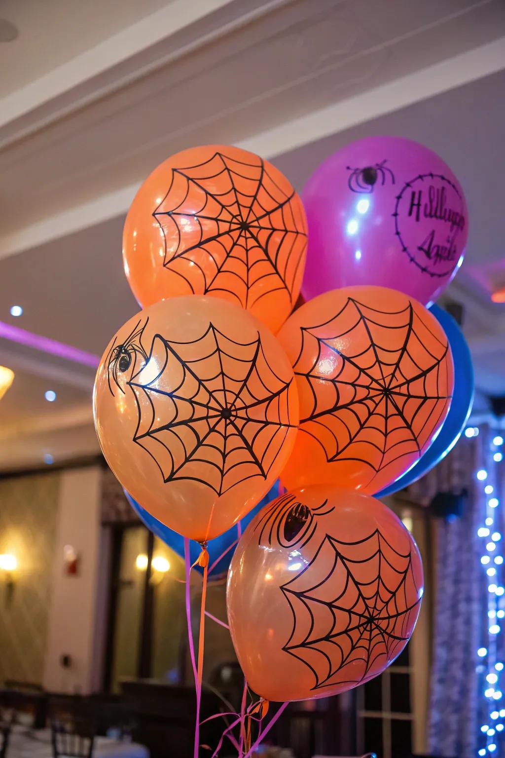🎈 Add some spooky flair with spider web balloons! #PartyDecor #HalloweenVibes